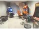 Game room with an assortment of arcade games and comfortable seating, perfect for entertainment at 4957 Seafoam Trl, Bradenton, FL 34211
