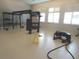 Gym with weight machines, rubber flooring, and multiple windows that provide natural light at 4957 Seafoam Trl, Bradenton, FL 34211