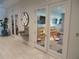 A bright playroom with toys and storage shelves, offering a fun and safe environment for children at 4957 Seafoam Trl, Bradenton, FL 34211