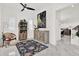Bright foyer with neutral decor, white walls, decorative rug, and ample natural light at 5006 W Idaho St, Tampa, FL 33616