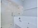 Bright bathroom features a glass shower, a soaking tub, and modern fixtures at 512 Pinewalk Dr, Brandon, FL 33510