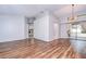 Spacious living room with vaulted ceilings and a view of the screened porch at 512 Pinewalk Dr, Brandon, FL 33510