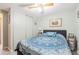 Charming bedroom with closet and picture frames at 5706 Benton St, Zephyrhills, FL 33542