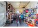 The garage provides ample storage space and organization for tools and recreational equipment at 5706 Benton St, Zephyrhills, FL 33542