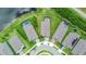 Stunning aerial view of homes with pools and landscaping situated next to a lake, creating a picturesque neighborhood at 6211 Sea Air Dr, Apollo Beach, FL 33572