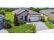 Well maintained single-Gathering home with a stone facade and a neat front yard at 6211 Sea Air Dr, Apollo Beach, FL 33572