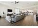 Open-concept living space with kitchen, dining and living area, great for entertaining with modern decor at 6211 Sea Air Dr, Apollo Beach, FL 33572