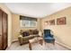 Cozy living room features neutral walls and comfortable seating at 6709 Peachtree Dr, Temple Terrace, FL 33617