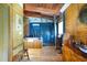 Bathroom with a soaking tub, glass shower, wood and tile accents, and unique design features at 6924 Valrie Ln, Riverview, FL 33569