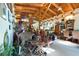 Spacious living area with vaulted wood ceilings, natural light, unique decor, and an open layout at 6924 Valrie Ln, Riverview, FL 33569