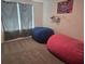 Relaxing bedroom area with comfy beanbag chairs at 7575 Sail Clover Ln, Zephyrhills, FL 33540