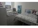 Cozy bedroom with natural light and carpet floors at 7575 Sail Clover Ln, Zephyrhills, FL 33540