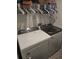 Bright laundry room with a new washer and dryer at 7575 Sail Clover Ln, Zephyrhills, FL 33540