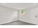 The bedroom has a window and private access to the backyard at 7835 Wallaba Ln, New Port Richey, FL 34653