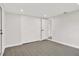 A view of the bedroom including walk in closet and ensuite access at 7835 Wallaba Ln, New Port Richey, FL 34653