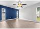 Bedroom featuring hardwood floors and natural light from the windows at 8927 95Th N St, Seminole, FL 33777