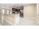 This kitchen features stainless steel appliances, granite countertops and ceramic tile floors at 8927 95Th N St, Seminole, FL 33777