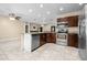 A kitchen that is equipped with stainless steel appliances, recessed lighting and tile floors at 8927 95Th N St, Seminole, FL 33777