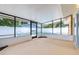 Screened patio offers relaxing views of backyard and pool at 8927 95Th N St, Seminole, FL 33777