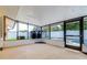 Screened patio with view of the pool and backyard at 8927 95Th N St, Seminole, FL 33777