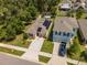 Aerial view of the house with solar panels in the roof at 9016 Water Chestnut Dr, Temple Terrace, FL 33637