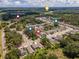 Community aerial view showcases nearby Flatwoods Park, playground, Morris Bridge Rd, and Dog Park, for outdoor enjoyment at 9016 Water Chestnut Dr, Temple Terrace, FL 33637