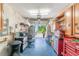 Open garage door with storage cabinets along the side walls at 9016 Water Chestnut Dr, Temple Terrace, FL 33637