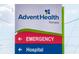 Advent Health Tampa sign with directions to the emergency room and hospital entrance at 9016 Water Chestnut Dr, Temple Terrace, FL 33637
