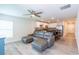 Open floor plan showcasing living room and kitchen with stainless appliances at 9016 Water Chestnut Dr, Temple Terrace, FL 33637