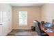 Well-lit office space with a desk setup and window view at 9016 Water Chestnut Dr, Temple Terrace, FL 33637