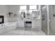 This luxurious bathroom features a soaking tub, walk-in shower, and double vanities at 9202 Brindlewood Dr, Odessa, FL 33556
