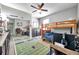 Unique bedroom featuring a bunk bed, sports themed rug, and contemporary décor elements at 9202 Brindlewood Dr, Odessa, FL 33556