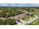Aerial view of a suburban neighborhood showcasing well-maintained homes, lush landscaping, and tree-lined streets at 10409 Glen Willow Ln, Tampa, FL 33647