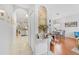 Inviting entryway showcases decorative arches leading to dining area and open-concept kitchen at 10409 Glen Willow Ln, Tampa, FL 33647