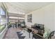 Outdoor patio with a lounge area, chairs, lighting, and brick flooring at 10409 Glen Willow Ln, Tampa, FL 33647