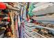 Organized walk-in closet with clothes, hats, shoes, shelving, and drawers for ample storage at 10409 Glen Willow Ln, Tampa, FL 33647