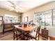 Charming dining room featuring hardwood floors, natural light, and classic decor, perfect for Gathering meals and gatherings at 1136 Granada St, Clearwater, FL 33755