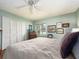 Bedroom with a window, closet, and comfortable furnishings, providing a restful atmosphere at 1136 Granada St, Clearwater, FL 33755
