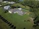 Expansive property with a home, garage, and a meticulously maintained lawn at 11908 Pilot Country Dr, Spring Hill, FL 34610