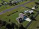 Real estate showcasing meticulously landscaped grounds and proximity to an airstrip at 11908 Pilot Country Dr, Spring Hill, FL 34610