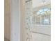 Bathroom doorway looking towards the sink and mirror with views to the toilet and tub area at 11908 Pilot Country Dr, Spring Hill, FL 34610