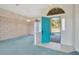 Light-filled entryway with an arched window and a view to the front yard at 11908 Pilot Country Dr, Spring Hill, FL 34610