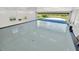 Open garage with large door to the outdoors at 11908 Pilot Country Dr, Spring Hill, FL 34610