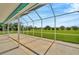 Spacious screened-in lanai perfect for outdoor living and entertaining at 11908 Pilot Country Dr, Spring Hill, FL 34610