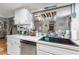 Kitchen with sleek appliances and convenient access to the dining and living areas at 12234 Cider Mill Ln, Hudson, FL 34667
