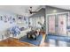 A cozy living room with hardwood floors, modern decor and beautiful entryway at 12234 Cider Mill Ln, Hudson, FL 34667