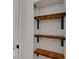 Closet with custom wood shelving and ample storage capacity at 1320 Dixie S Ln, St Petersburg, FL 33707