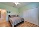 Light-filled bedroom featuring a ceiling fan, closet, and serene ambiance for peaceful nights at 13252 Graham Yarden Dr, Riverview, FL 33579