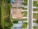 Aerial view of property in neighborhood, showcasing location near street and waterway at 1712 Azalea Ct # A, Oldsmar, FL 34677