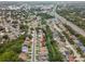 An aerial view of the property showing proximity to a highway, waterways and commercial spaces at 1712 Azalea Ct # A, Oldsmar, FL 34677